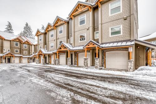 a row of houses on a snow covered street at Collins Lake #41 in Government Camp
