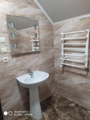 Ένα μπάνιο στο Котедж Кресаня