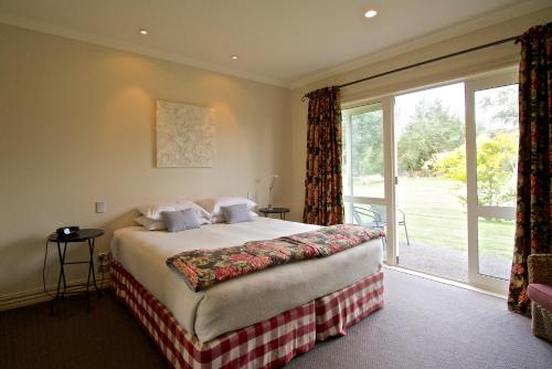 מיטה או מיטות בחדר ב-Ruapehu Country Lodge