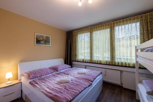 Postel nebo postele na pokoji v ubytování Apartment Mariazell Bürgeralpe