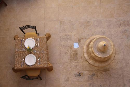 an aerial view of a table and a sea shell at Dar Sitti Aziza in Bethlehem
