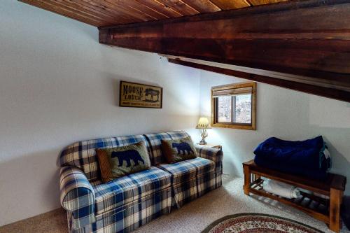 a living room with a couch and a table at N10 Sandtrap Loop in Bartlett