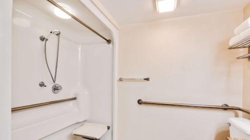 a bathroom with a shower and a toilet at Best Western Fishers Indianapolis Area in Fishers