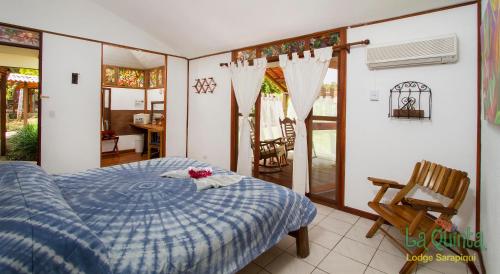 Cama o camas de una habitación en La Quinta Sarapiqui Lodge