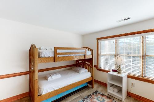 Postel nebo postele na pokoji v ubytování Palm Pines PI36
