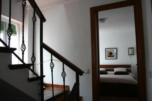 A bed or beds in a room at Casa Sonrisa