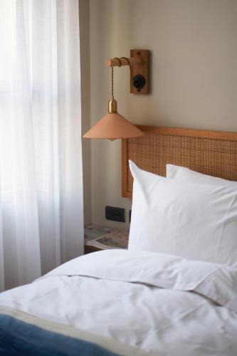 Postel nebo postele na pokoji v ubytování OR Inn