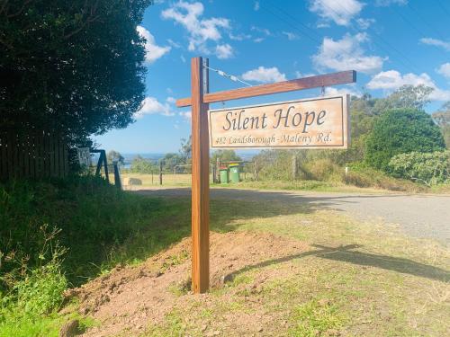 a sign for a short hope not enrollment authority sidx sidx sidx at Silent Hope Cottages in Bald Knob