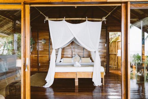 Katil atau katil-katil dalam bilik di Soultribe Beach Retreat