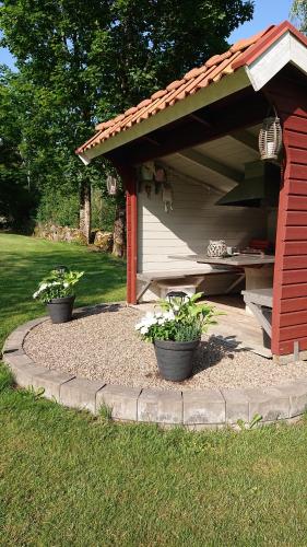 Zahrada ubytování Gällared 710 - Bed & Kitchen