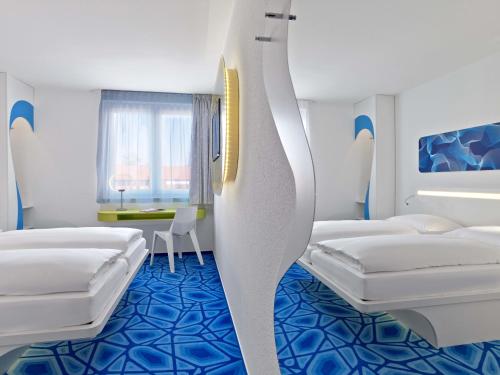 Postel nebo postele na pokoji v ubytování Prize by Radisson, Hamburg City