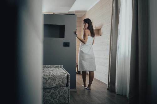 Postel nebo postele na pokoji v ubytování Hotel Bezzi