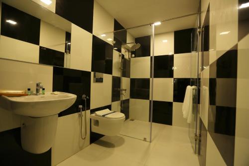 Koupelna v ubytování Mehar Inn Hotel