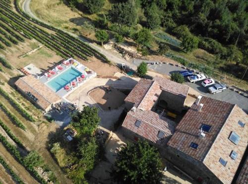 an aerial view of a house with a swimming pool at Domaine des hauts de Vernon in Vernon