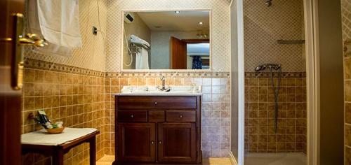 Ванная комната в Hotel Rural El Jardin