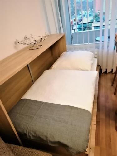 a pair of beds in a room with a window at 2 Zimmer Apartment Hannover in Hannover