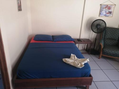Una cama o camas en una habitación de Cahuita Lodge