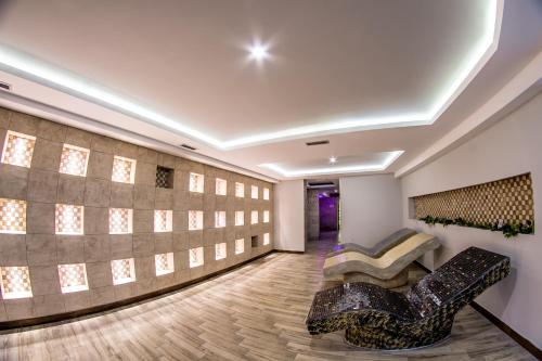 Posezení v ubytování Milmari Resort M16 Markovic