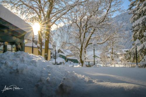 a pile of snow in front of a building at Landhotel Pacher in Obervellach