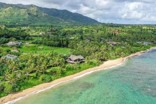 an aerial view of a beach with a house at Sandcastles TVNC#1305 in Anahola