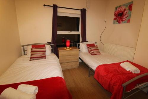Katil atau katil-katil dalam bilik di Staveley House