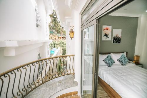 Postel nebo postele na pokoji v ubytování Memory Inn - Green Villa