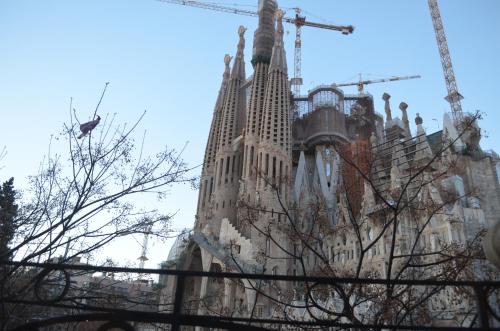 a building under construction with a crane at Gaudí Apartment in Barcelona