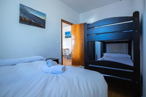 Postel nebo postele na pokoji v ubytování APARTAMENTO IRIS