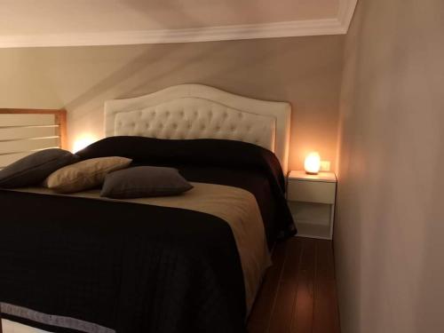 Łóżko lub łóżka w pokoju w obiekcie La Maison du Relax