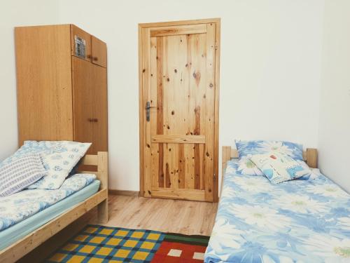 Postel nebo postele na pokoji v ubytování Kwatery w Gołdapi