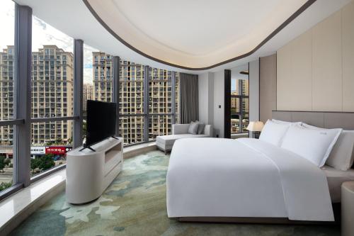 Katil atau katil-katil dalam bilik di Holiday Inn Ningde Dijing by IHG