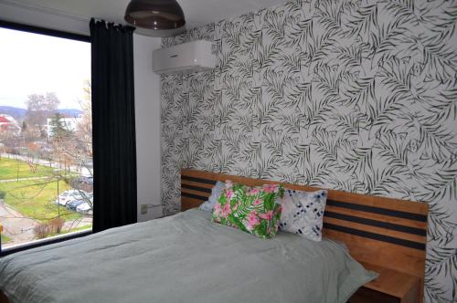 Ένα ή περισσότερα κρεβάτια σε δωμάτιο στο New Apartment at a Great Location