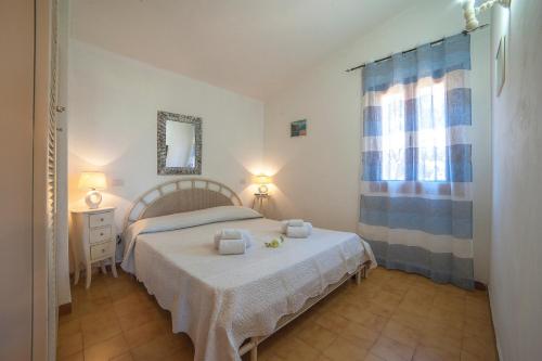 A bed or beds in a room at villa lilly