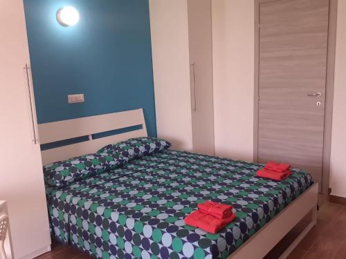 En eller flere senge i et værelse på SUITEVISTAMARE Copanello-Caminia-Soverato