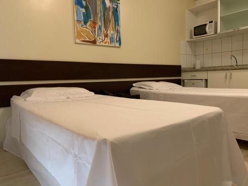 מיטה או מיטות בחדר ב-Flat Athenas 1402