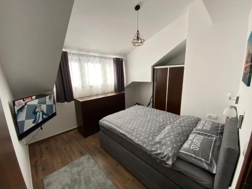 Un ou plusieurs lits dans un hébergement de l'établissement Apartman 24(Vila Montana)
