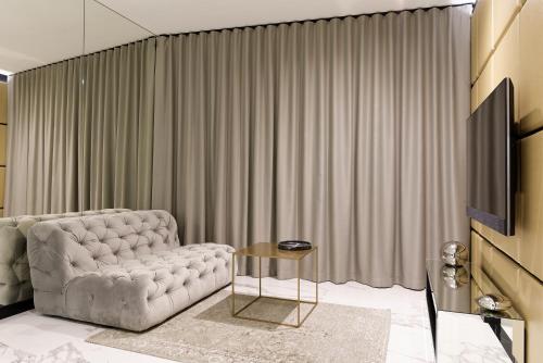 TV a/nebo společenská místnost v ubytování Super-Apartamenty VIP Jacuzzi