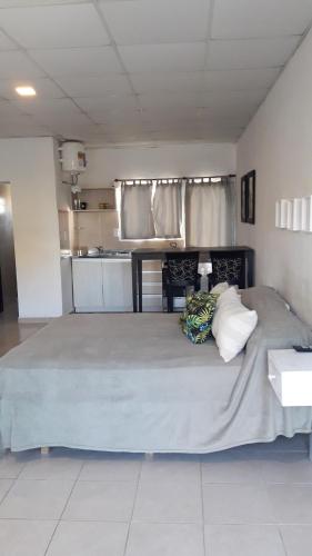 a bedroom with a large bed in a room at Ananá in Federación