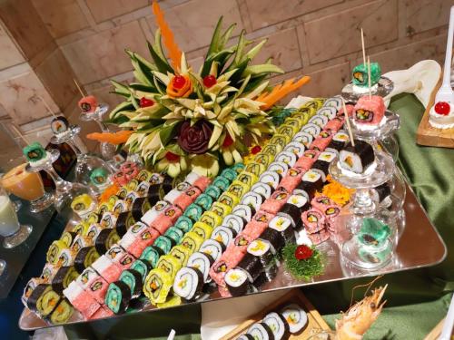 a table topped with lots of different types of food at Happy Life Village Dahab in Dahab