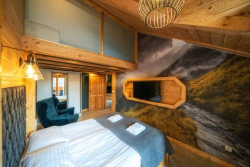 Aparthotel Giewontにあるベッド