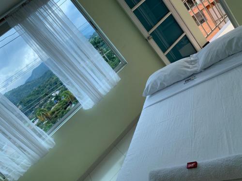 Ліжко або ліжка в номері Hotel Bellavista Premium