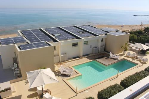 an image of a house with solar panels on the roof at Dimore di Mare in Termoli