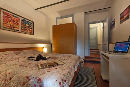 Cama o camas de una habitación en Alloro