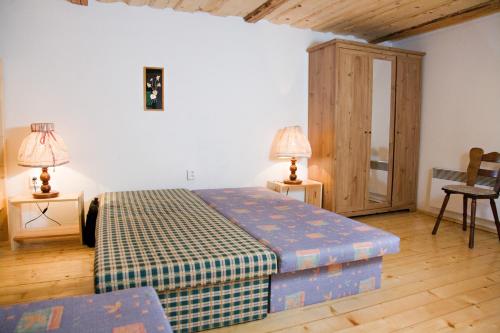 Postel nebo postele na pokoji v ubytování Chata Donovaly