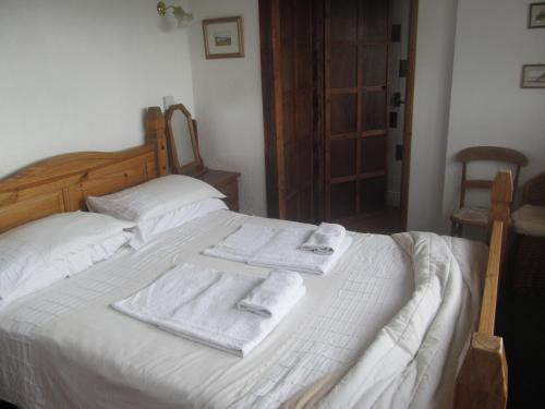 Ένα ή περισσότερα κρεβάτια σε δωμάτιο στο Upton Cross B&B
