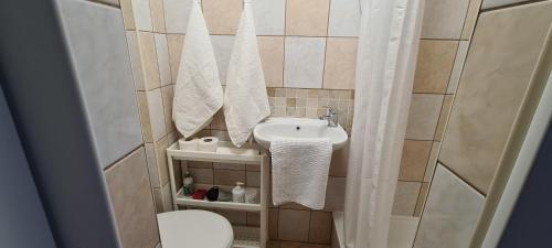 Kúpeľňa v ubytovaní Komodor - OZONOWANE pokoje gościnne