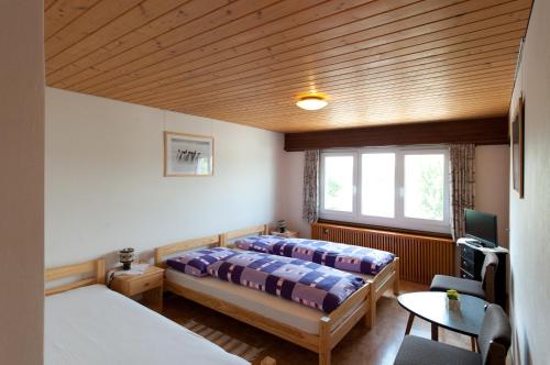 เตียงในห้องที่ Gasthof Freienhof