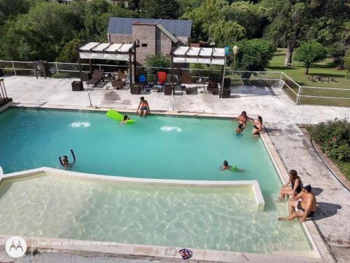 Bazén v ubytování La Castellana Hotel de Sierras nebo v jeho okolí
