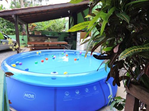 a large blue tub with balls in it at Castelo da Ilha in Florianópolis