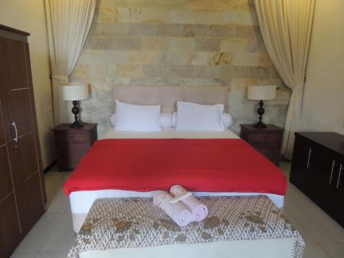 Tempat tidur dalam kamar di Oase Van Java